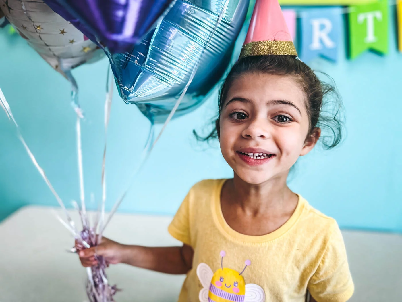 A little girl at a Romp n' Roll birthday party - contact us today for birthday party business opportunities.