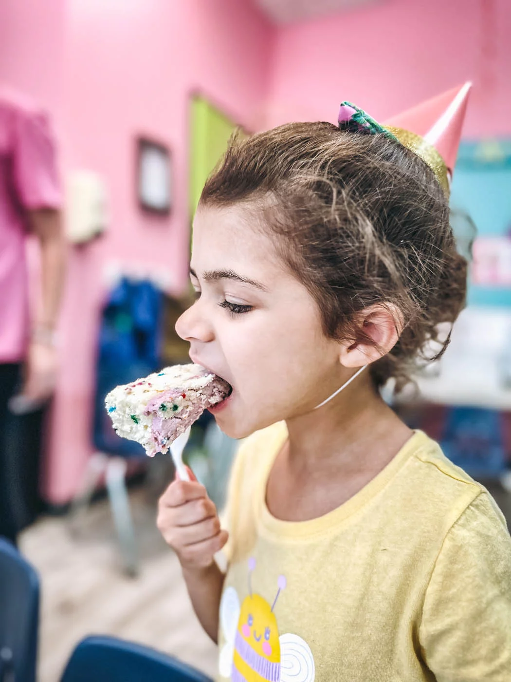 A young girl having fun at a Romp n' Roll birthday party event.