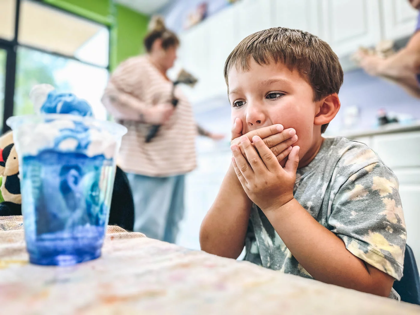 A young boy enjoying our science classes at Romp n' Roll.