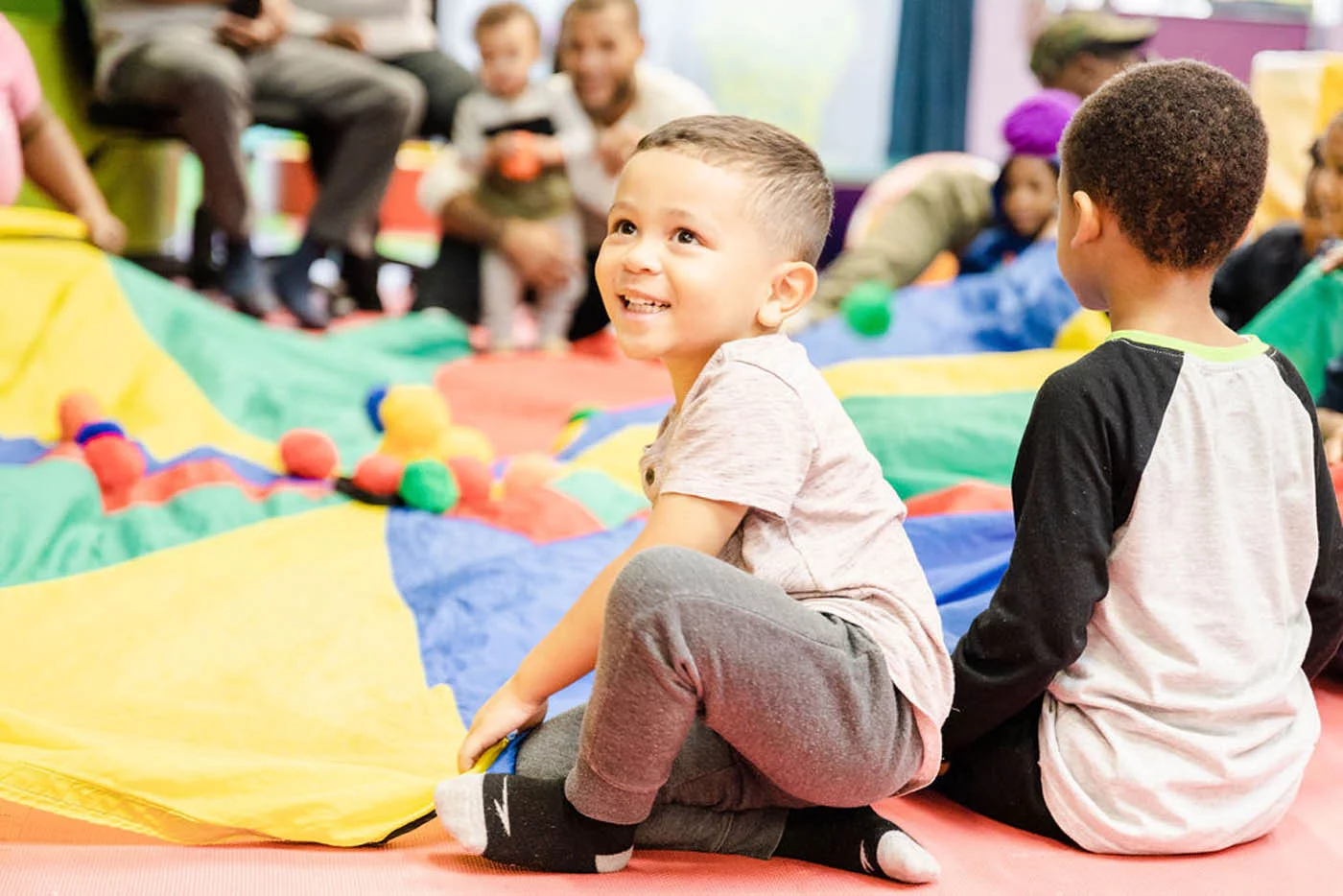 A group of kids playing at Romp n' Roll - learn about investing in a franchise ownership with us.