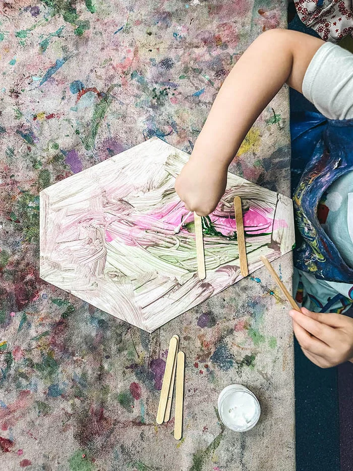 A shot of a Romp n' Roll art class table - messy and creative at the same time.